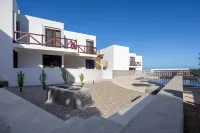 Ocean Views from every room! Modern Condo near the beach. No cleaning Fees!