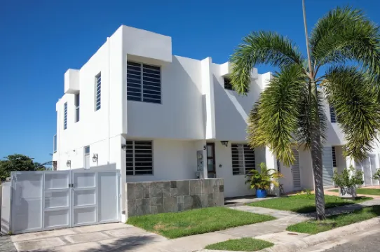 Beachfront in gated community with patio,  balcony, pool, close to all in Rincón