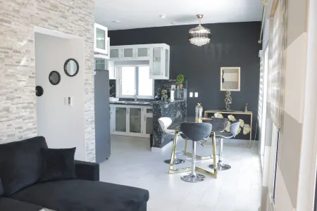 A modern 2-bedroom villa with pool and lounge area