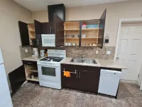 Contemporary & Cheerful 1-Bedroom Suite with Fireplace Hotels in Southeast Edmonton