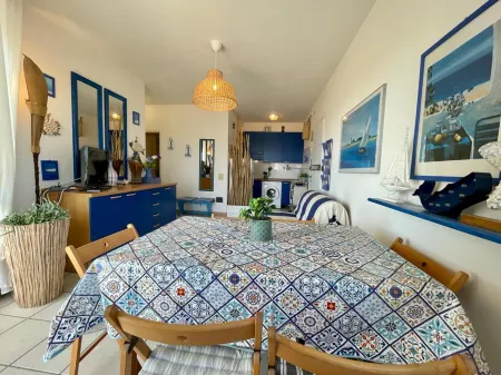 Stunning Seafront Apartment Отели в г. Каорле