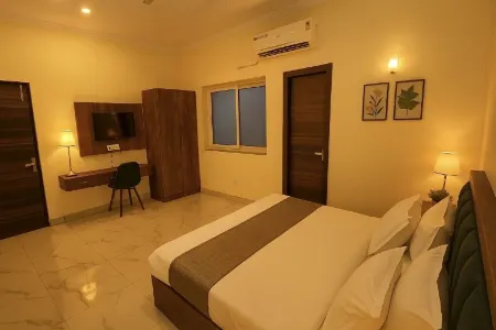 Hotel Stayzzy Bloom Отели рядом с достопримечательностью «Jaypee Institute of Information Technology»