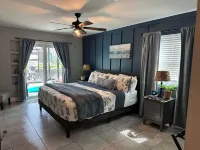 Gulf access pet friendly waterfront oasis with NEW heated salt water pool & spa