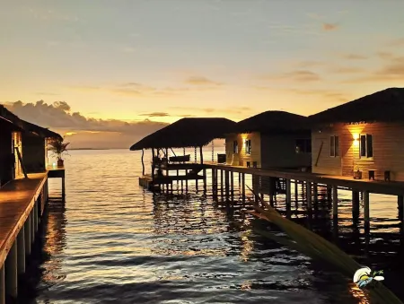 Ocean Light Over Water Bungalow, Bedroom, King Bed, Living Room, Kitchenette