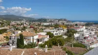 Vacation home in Almuñécar with beautiful city, mountain and sea views.