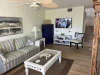 Charming 2-bedroom condo with AC, WiFi in serene Bokeelia FL.With boat slip