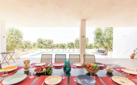 Spacious pool villa with sweeping sea views in extensive olive grove