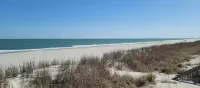 Beach, ocean front condo 6 guests , 2 br, queen sofa bed,  p.u. crib.