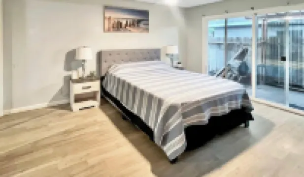 Beautiful Home in quiet neighborhood with a pool and close to stores & highways.