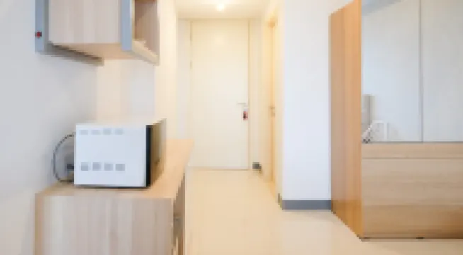 Cozy Stay Studio Connected with Mall at Supermall Mansion Apartment By Travelio