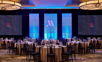 a formal dining room set up for a special event , with tables and chairs arranged for a formal dinner at Portland Marriott Downtown Waterfront