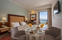 John & George Hotels in Tolo