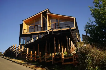 Hotel & Cafe Veliche Отели в г. Чилоэ