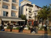 Kerman Hotel Отели в г. Чешме