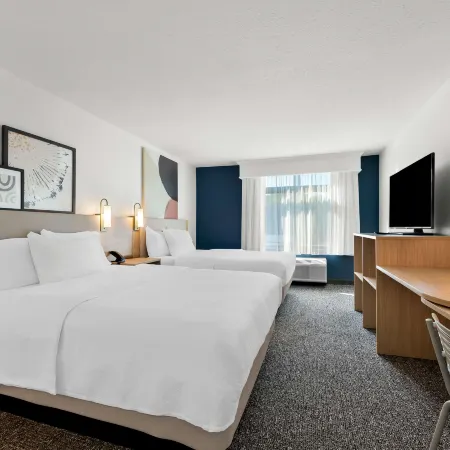 Spark by Hilton Tupelo