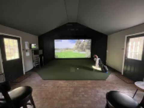 Your Private Clubhouse with Golf Simulator and Pool Hotels in Pinehurst