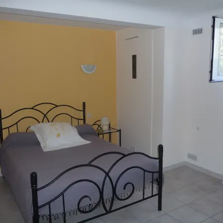 Spacious apartment in villa with large private garden and terrace near the sea