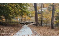 Luxurious 5-Bedroom Lakeside Retreat with Hot Tub, Fire Pit and Dolly Room