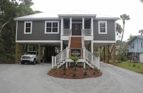 SEABATICAL. Lovely beach house steps to the beach with private pool