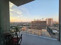 Downtown Luxury High-Rise Retreat: Panoramic City Views & Modern Amenities