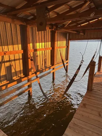 Peaceful lake front home with wrap around porch and relaxing views! Отели в г. Юнион Пэриш