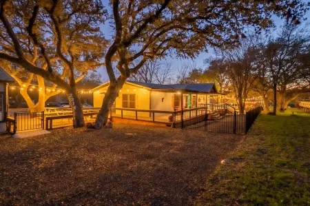 Luxury WATERFRONT home with HEATED POOL AND SPA Sleeps 28+