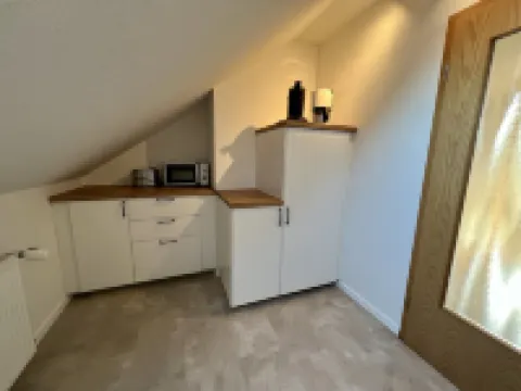 Vacation apartment "Leuchtturm" with large garden in the heart of Pilsum