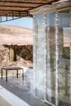 An architectural oasis with large swimming pool, along a breath-taking scenery.