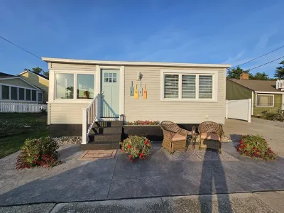 Historic Beach House steps away from The Deck & across from the beach.