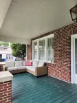 Enjoy small-town, Main Street from the front porch of this historic bungalow!