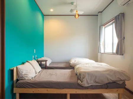 Guesthouse Simone Отели рядом с достопримечательностью «Seaside Base ARARI シーサイドベース安良里 グランピング»