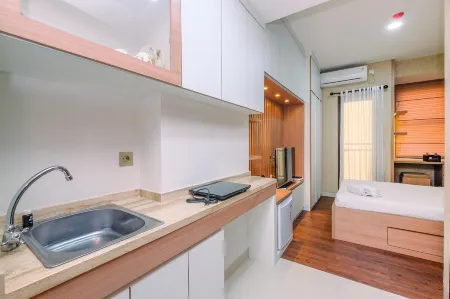 Cozy Studio at Transpark Cibubur Apartment Отели рядом с достопримечательностью «Gunadarma University F6»