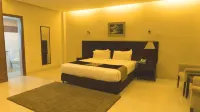 The Avenue Hotel & Suites Hotel a 