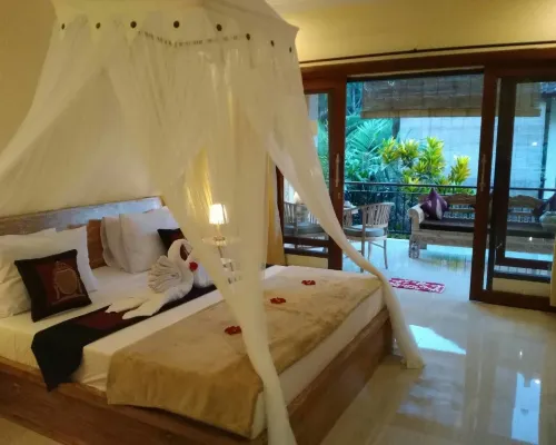 Qiul Guest House Hoteles cerca de Museo de Arte Angung Rai (ARMA
