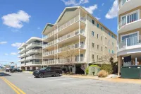 Spacious Condo with Elevator Access and Free Parking - Inviting Coastal Retreat