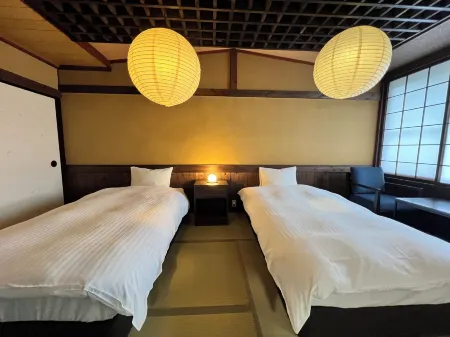 Yusai Bekkan Отели рядом с достопримечательностью «Hiranodai Highland Viewing Platform»