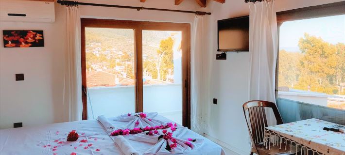 Santo Akyaka Home Hotéis em Ula