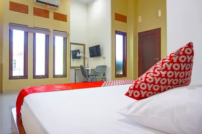 Hotel O Homestay Anitha Syariah Makassar Hotels near Shop And Drive M'tos Makassar