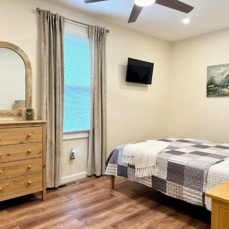 Cozy Waterfront Oasis – Hot Tub, Sauna, Firepit, Creek Views, Pet Friendly