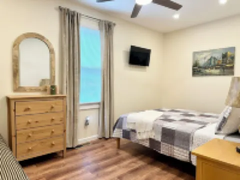 Cozy Waterfront Oasis – Hot Tub, Sauna, Firepit, Creek Views, Pet Friendly