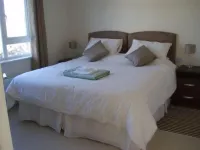 Luxurious Waterfront Holiday Homes with Private Pebble Beach & Free WiFi.