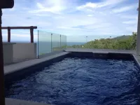 Steps from the beach with private heated pool and incredible views