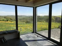 Modern House-new building with a distant view in the National Park, the "Eifelsteig"