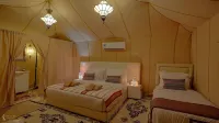 Room in Bungalow - Saharian Luxury Camp فنادق في تسردمين