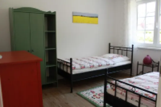 Fantastic apartment in a thatched house (ground floor) with large terrace and child-friendly garden