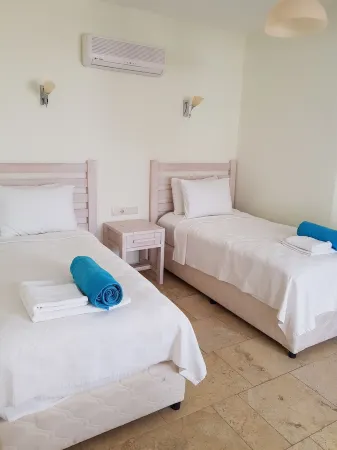 Lovely 2 bed 2 bath apartment semi private infinity pool and stunning sea views Отели рядом с достопримечательностью «Kaputas Beach»