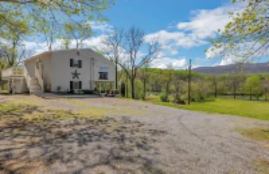 Riverside Serenity: A Picturesque Retreat 2 Bedroom Cottage by RedAwning