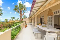 Royal Beach House with sea view and large community pool.