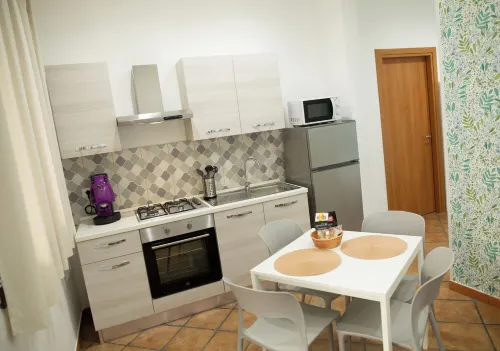 "Comfortable Ground Floor Apartment - Two Steps from the Beach"