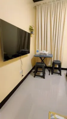 Cozy 2-bedroom lodge with WiFi, AC in charming Bagac Hotels in Bagac